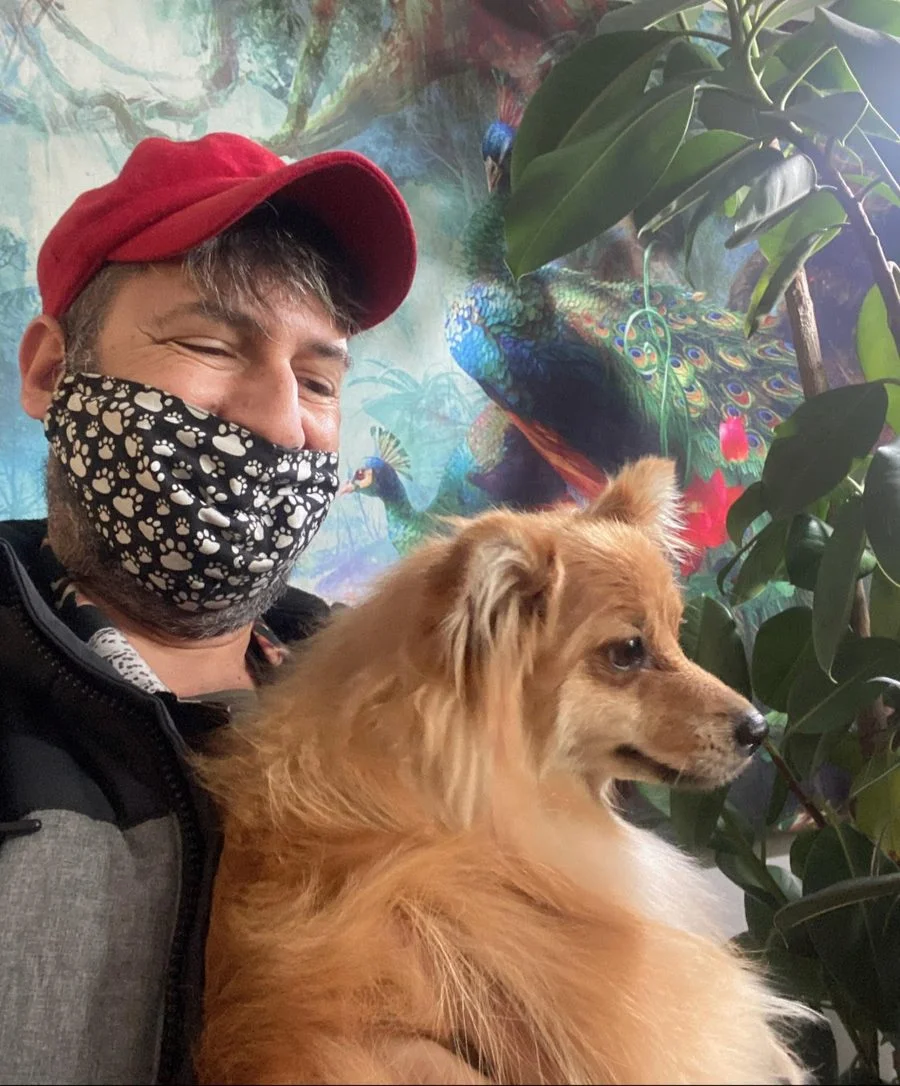 Adonis, founder of Circle of Fluff, with a freshly groomed pomeranian